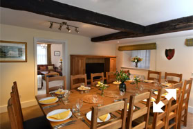 Dining room, with glimpse into sitting room